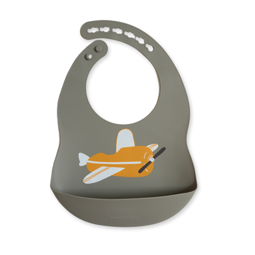 Bavoir en silicone pour bébé vert avec un avion jaune